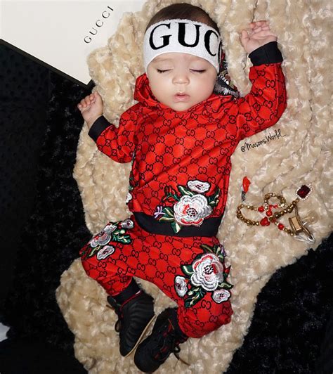 gucci baby store|newborn baby wearing gucci.